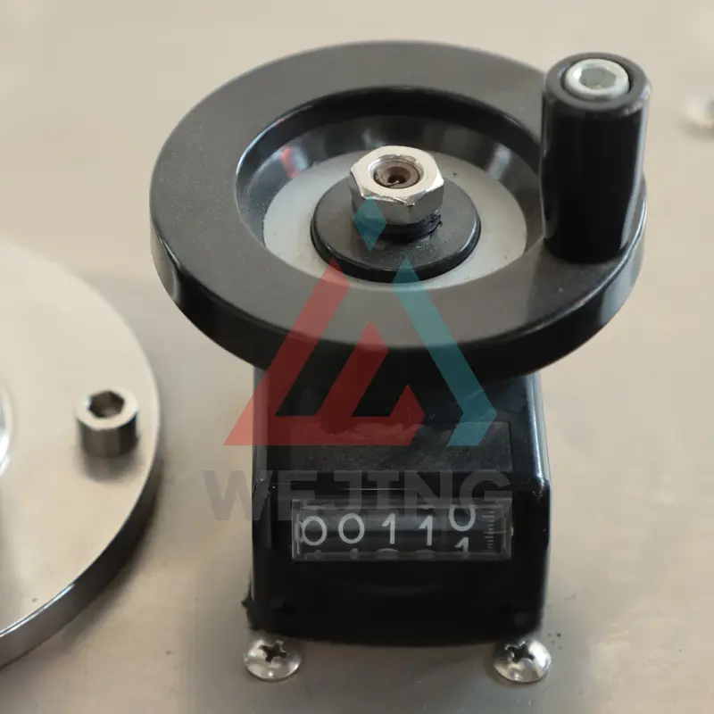 Filling machine adjustment wheel